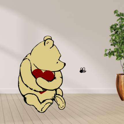 Adorable bear cutout holding a heart, perfect for baby showers, birthday parties, or nursery wall decor.