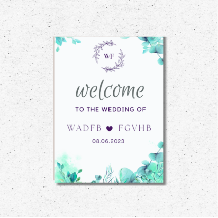 Modern watercolor wedding welcome sign with teal greenery accents on easel.