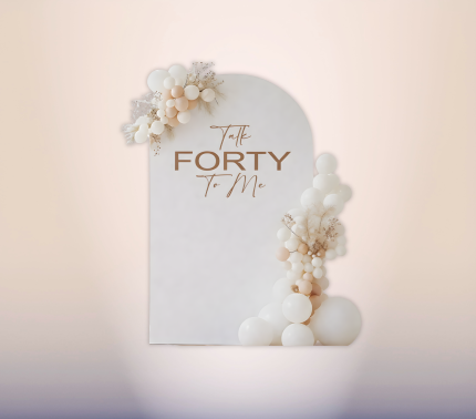 Talk Forty to Me 40th birthday arched backdrop with neutral balloon and dried floral decorations