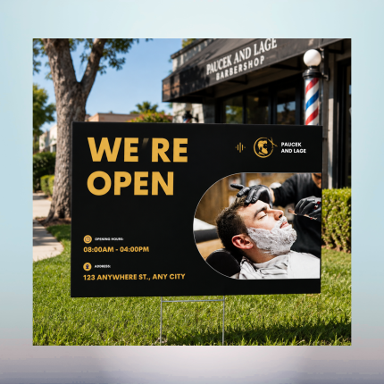 Custom We're Open business yard sign displayed outside a barbershop