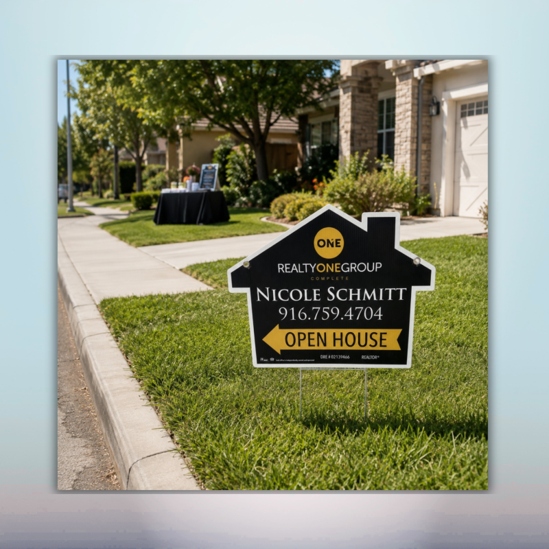 Custom black and gold realtor open house yard sign installed on a residential lawn
