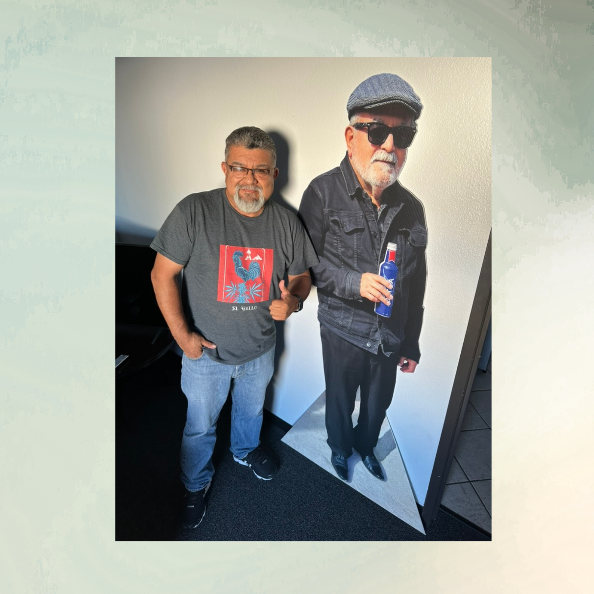 Custom life-size photo standee displayed beside guest for realistic size comparison