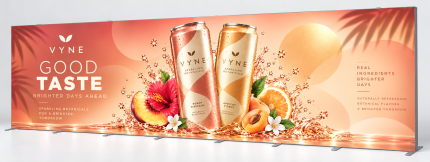 20 ft SEG fabric display with custom peach beverage graphics and aluminum frame