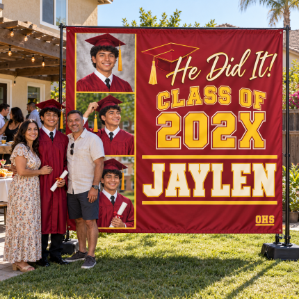 Jaylen and his parents posing beside a red and gold graduation photo backdrop featuring three portraits and Class of 202X.